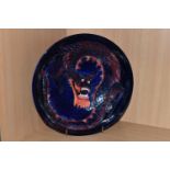 A MOORCROFT DRAGON BOWL, designed by Trevor Critchlow for Moorcroft, a bowl decorated with a red and