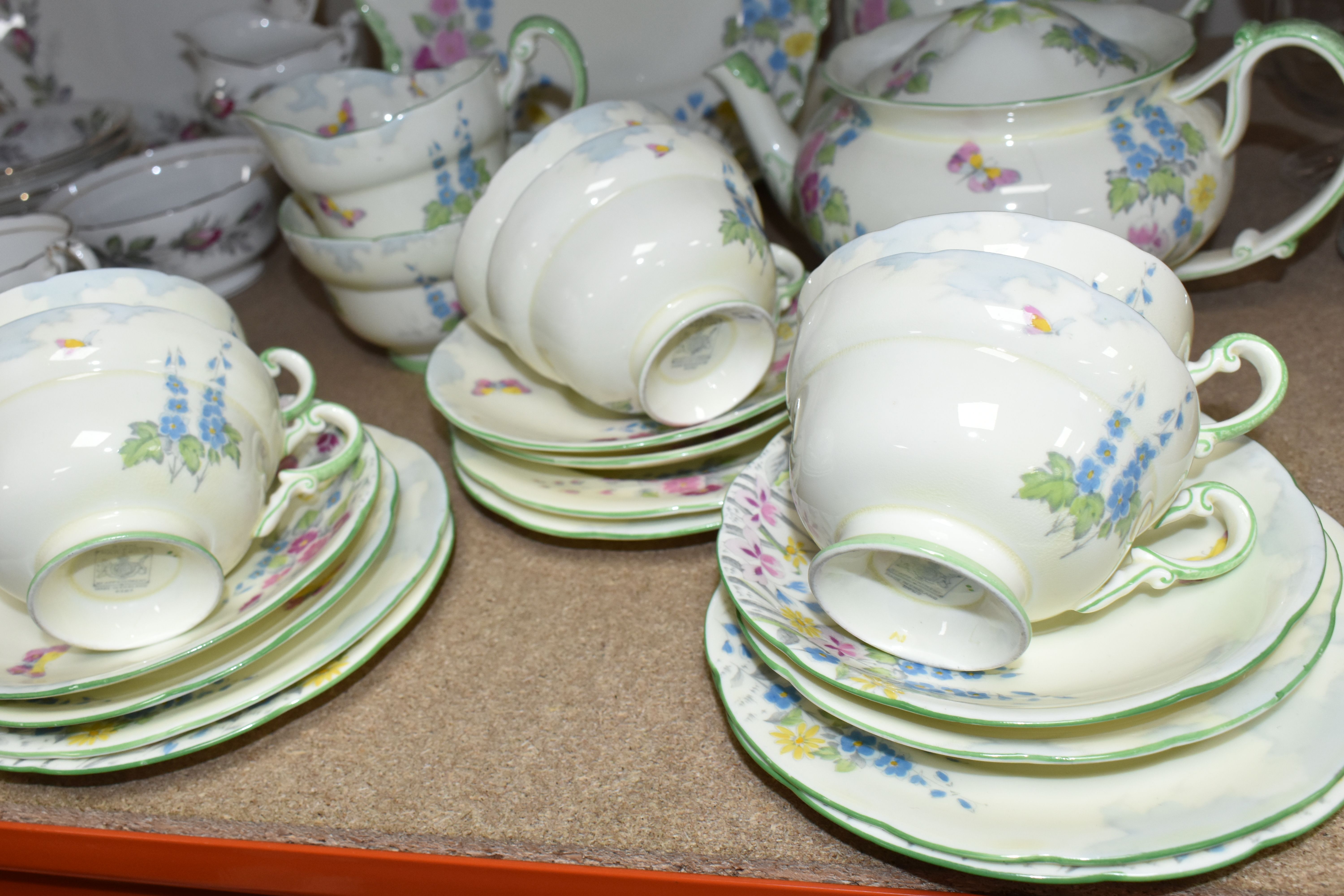 TWO PARAGON TEA SETS, comprising a twenty four piece tea set printed and tinted with butterflies, - Image 6 of 12