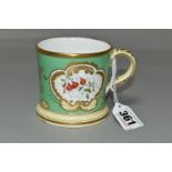 A COALPORT HANDPAINTED SMALL MUG, unsigned, monogrammed and dated M.H 1843 in gold gilt, decorated