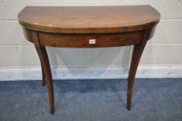 A GEORGIAN FRUITWOOD AND ROSEWOOD CROSSBANDED CARD TABLE, the fold over top is enclosing a green