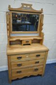 AN EDWARDIAN SATINWOOD DRESSING CHEST, with a single swing mirror, and four drawers, width 91cm x