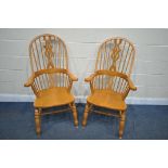 A PAIR OF BEECH HOOP BACK WINDSOR ARMCHAIRS (condition report:-good) (2)