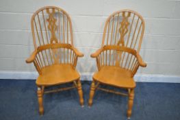A PAIR OF BEECH HOOP BACK WINDSOR ARMCHAIRS (condition report:-good) (2)