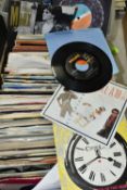 A TRAY CONTAINING OVER TWO HUNDRED AND FIFTY 7in SINGLES artists include Elvis Presley, The Who, The