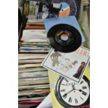 A TRAY CONTAINING OVER TWO HUNDRED AND FIFTY 7in SINGLES artists include Elvis Presley, The Who, The