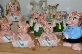 NINE WADE NAT WEST PIGGY BANKS, comprising four x Woody - one boxed, three x Annabel, Maxwell and