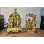 TWO GILT METAL HINDU RELIGIOUS FIGURES, comprising Radha and Krishna swinging together, height 27cm,