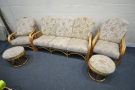 A FIVE PIECE WICKER CONSERVATORY SUITE, comprising of a three-seater sofa, width 174cm x depth