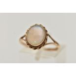 A 9CT GOLD OPAL RING, oval cut opal cabochon, collet set with a fine rope twist surround, bifurcated