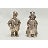 A PAIR OF 20TH CENTURY CONTINENTAL WHITE METAL PEPPERETTES IN THE FORM OF A DUTCH BOY AND GIRL