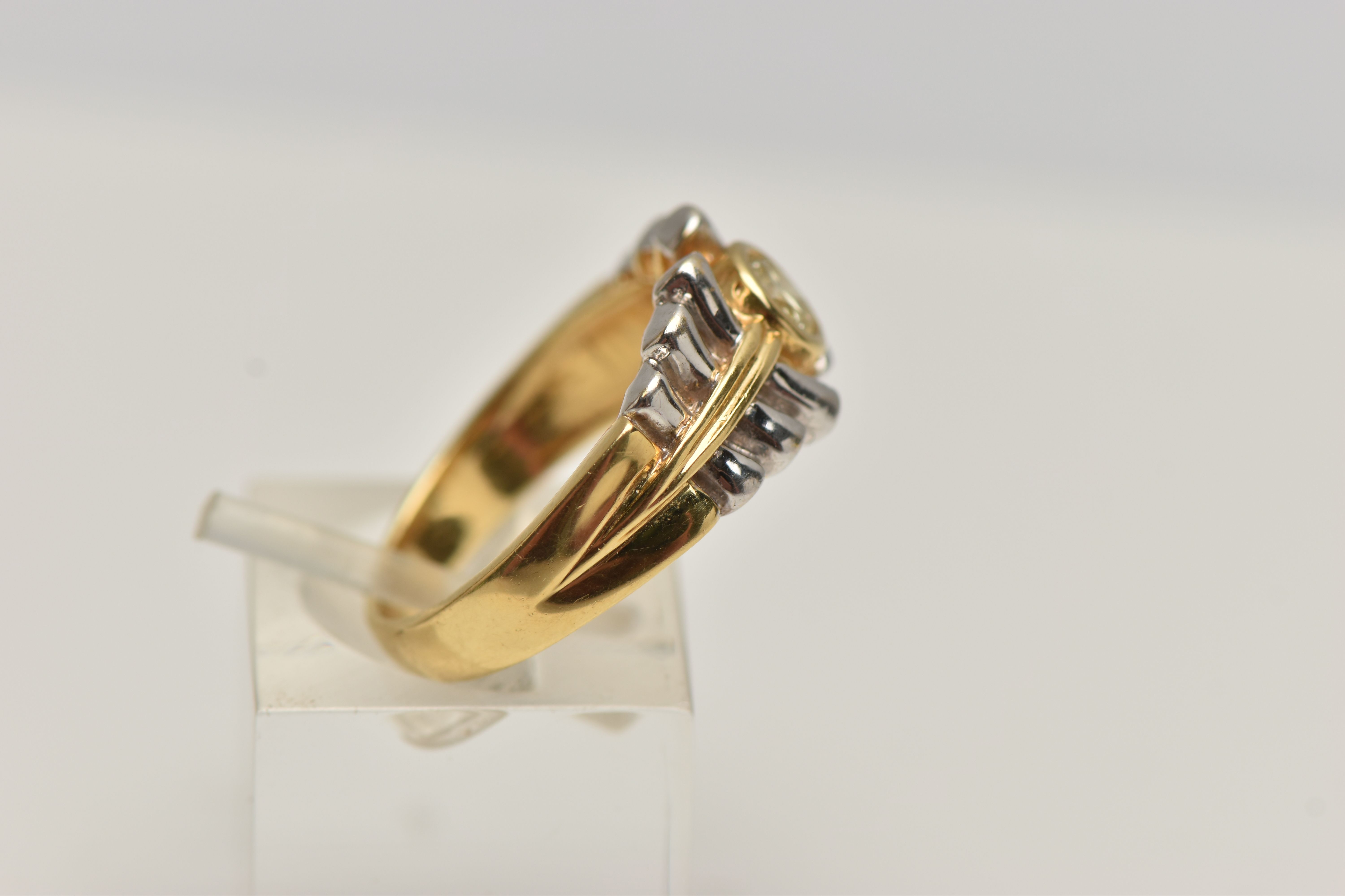 A YELLOW DIAMOND RING, designed as a round brilliant yellow diamond within a collet setting to the - Image 3 of 3