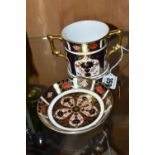 A ROYAL CROWN DERBY 1128 IMARI LOVING CUP AND AN 1128 PIN DISH, the loving cup height 7.5cm, both