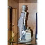 A BOXED LLADRO FIGURE, 5174 an art deco style figure of a woman titled Dama Cuplé, height 34cm (