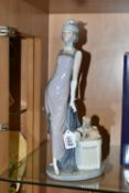 A BOXED LLADRO FIGURE, 5174 an art deco style figure of a woman titled Dama Cuplé, height 34cm (