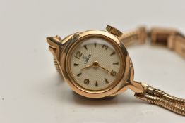 A LADYS 9CT GOLD, 'TUDOR' WRISTWATCH, manual wind, round textured cream dial signed 'Tudor',