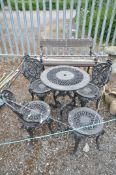 A BLACK PAINTED CAST IRON CIRCULAR GARDEN TABLE, diameter 61cm x height 69cm, three chairs, and a