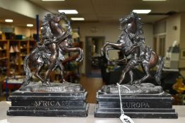 A PAIR OF SPELTER 'MARLEY HORSES' FIGURES, on black slate plinths (2) (Condition report: one