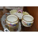 TWO LATE 19TH CENTURY ROYAL WORCESTER CAULDRONS AND A BELLEEK STYLE PORCELAIN SHELL BASKET, the