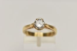 A MODERN SINGLE STONE DIAMOND RING, round brilliant cut diamond set in a yellow gold six prong