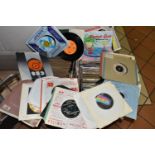 A BOX OF VINYL SINGLES, over three hundred records, artists to include Ian Drury and the Blockheads,