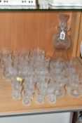 A SUITE OF TWENTY FOUR EDINBURGH CRYSTAL THISTLE PATTERN DRINKING GLASSES AND MATCHING DECANTER, the