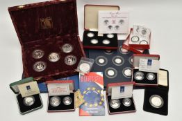 A CARDBOARD BOX OF MAINLY SILVER AND SILVER PROOF COINAGE, to include a 1984-1987 Silver proof £1