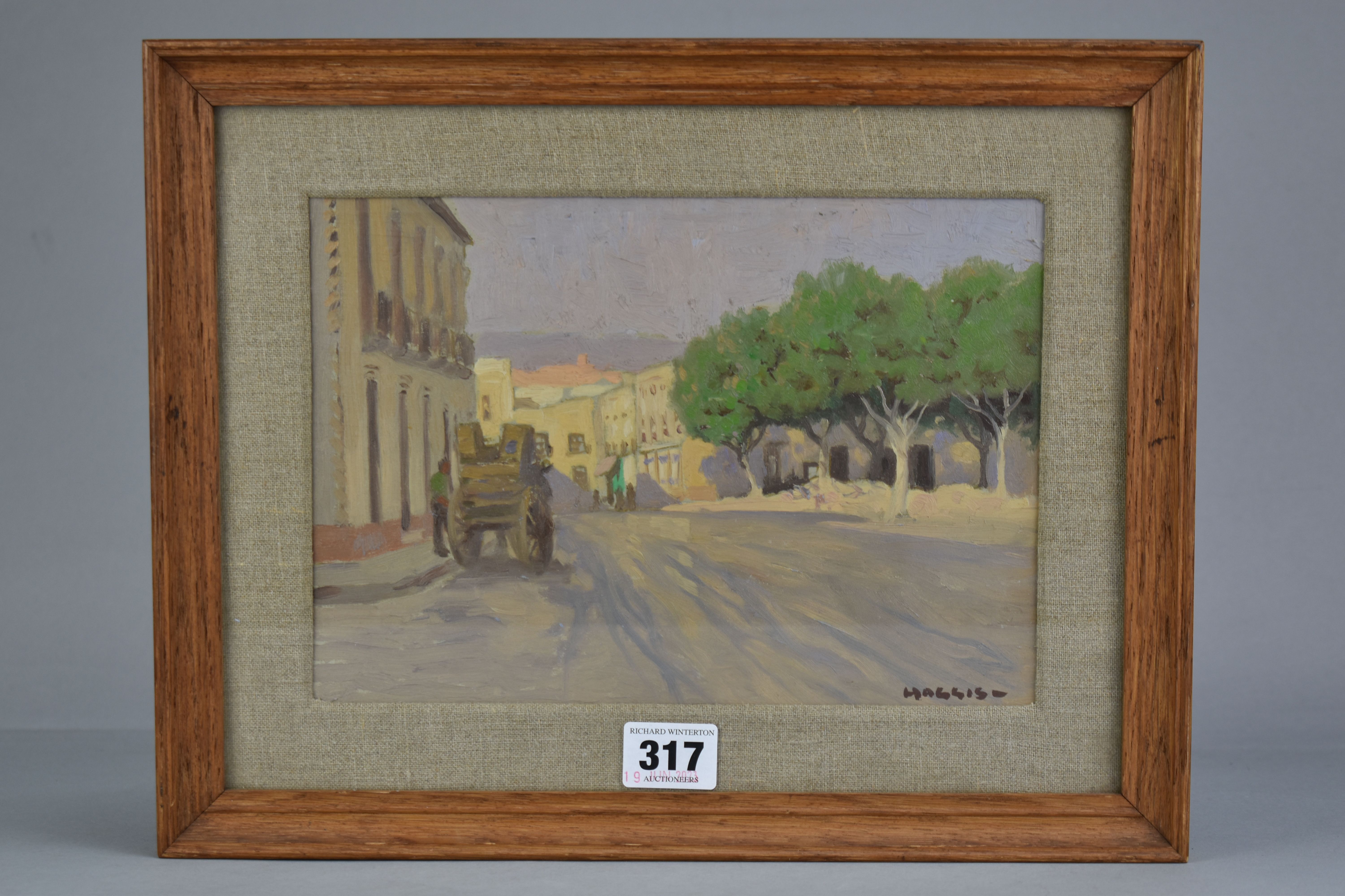 JOHN ALFRED HAGGIS (1897-1968) 'STREET IN ALMERIA', a view down a Spanish village street in 1957,