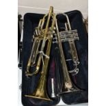 A BLESSING SCHOLASTIC TRUMPET with a 7C mouthpiece and hardcase Condition finish losses, repair to