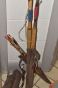 A SET OF JAQUES ARCHERY BOWS AND ARROWS, comprising a 20lb 5ft bow, an 18lbs 5ft bow in a canvas