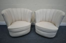 A PAIR OF ART DECO CREAM LEATHER CLOUD CHAIRS, on casters (condition report report:-leather finish