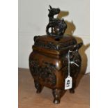 AN EARLY 20TH CENTURY JAPANESE BRONZE KORO, dragon finial to the square cover, grotesque mask twin