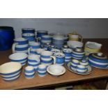 A COLLECTION OF T G GREEN CORNISH WARE, over thirty mostly blue banded pieces, to include a yellow