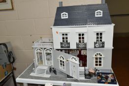 A GEORGIAN STYLE DOLL'S HOUSE, with conservatory and lighting, patio terrace, balconies and