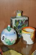 TWO PIECES OF NEWPORT POTTERY CLARICE CLIFF DESIGNS, comprising a 'Water Lily' preserve pot, a '