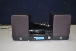 A DENON RCDM39DAB CD RECEIVER with remote and a pair of Q Acoustics 2010i speakers (PAT pass and all