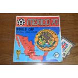 A PANINI WORLD CUP MEXICO 70 STICKER ALBUM, part complete, includes a quantity of loose