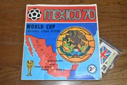 A PANINI WORLD CUP MEXICO 70 STICKER ALBUM, part complete, includes a quantity of loose