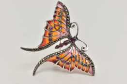 A WHITE METAL PLIQUE A JOUR BROOCH, in the form of a butterfly marcasite and ruby cabcohon detail to