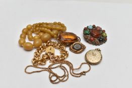 A BAG OF EARLY TO MID 20TH CENTURY JEWELLERY, to include a gold plated onyx brooch, unmarked, a