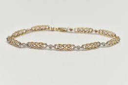 A 9CT GOLD DIAMOND LINE BRACELET, designed with a series of Celtic pattern open work links,