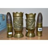 A NEAR PAIR OF TRENCH ART BRASS VASES AND TWO WWI BULLETS, the shell case vases with wavy rims and