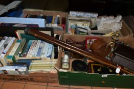 FOUR BOXES OF BOOKS AND MISCELLANEOUS SUNDRIES, to include two walking sticks, onyx candle holder, a