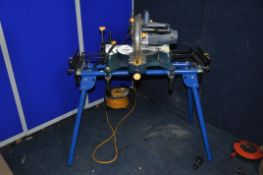 A SCHEPPACH UMF1600 FOLDING SAW STAND with roller supports at either end and a Performance Pro