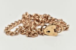 A 9CT GOLD BRACELET, two curb link bracelets fitted together with a heart padlock clasp, clasp