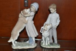 TWO LLADRO FIGURE GROUPS OF BOY AND GIRL WITH DOG, comprising 'My Loyal Friend', no. 6902 and 'A