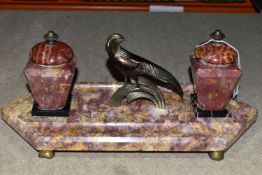 A ROSE AND ROUGE MARBLE INK STAND, with a central gilt metal Art Deco bird, base supported by four
