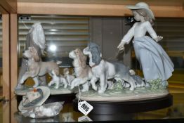 A large Lladro Spanish porcelain figure group Puppy Parade having printed Lladro Privilege mark