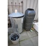 A GALVANISED INCINERATOR with lid, along with water but, and a bucket (3)