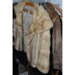 FOUR JACKETS AND ONE BOX, comprising a dark brown 'Astraka' faux fur, a blonde mink fur evening