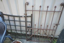 AN ANTIQUE WROUGHT IRON SINGLE GATE, 86cm x 93cm along with wrought iron spoked gate, 80cm x